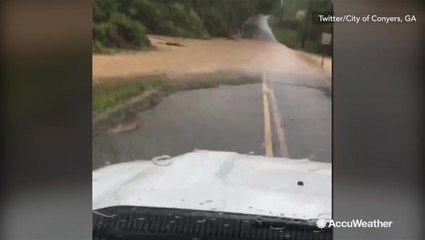 Road closed after getting swallowed by severe flooding