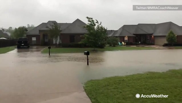 Homes and streets overwhelmed by flooding during severe storm