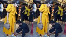 Sonam Kapoor's husband Anand Ahuja ties her shoelace in front of media; Check Out | FilmiBeat