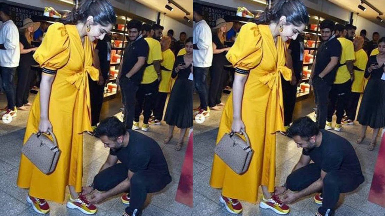 Sonam Kapoor's husband Anand Ahuja ties her shoelace in front of media; Check Out | FilmiBeat