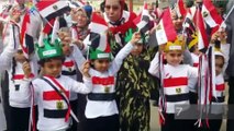 أطفال فيصل يرفعون أعلام مصر أمام لجان الاستفتاء