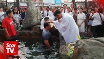30 people baptised on Easter Vigil in Sibu