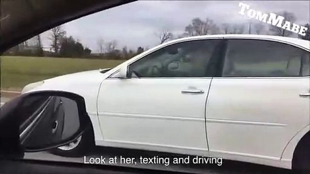 Il critique une femme qui téléphone au volant et ne regarde pas la route devant lui...