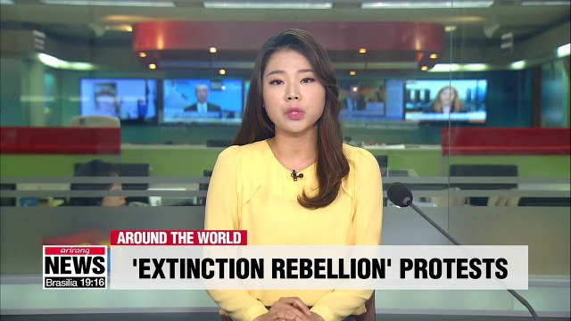 Climate change activists continue their protest at London's Natural History Museum