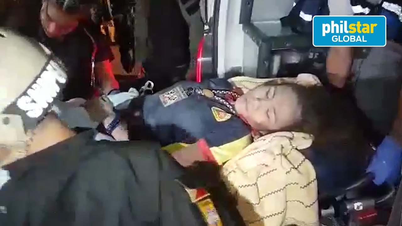 Rescuers transport a survivor in the Chuzon Supermarket collapse to Jose Songco Lapid District Hospital in Porac, Pampanga