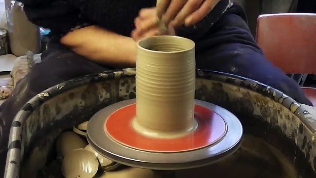 Making _⁄ Throwing a ceramic clay pottery Apple on the wheel