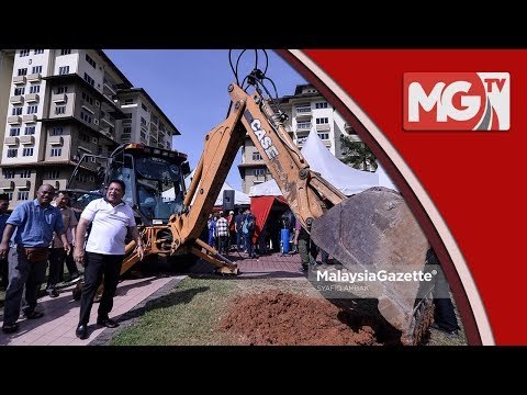 Ku Nan Rasmi Pecah Tanah Tempat Letak Kereta Bertingkat