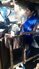 Beautiful woman running chicken shop in India