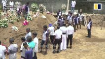 Mass funerals held for victims of Sri Lankan Easter Sunday bomb attacks as government admits intelligence failures