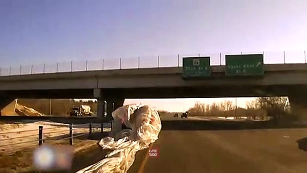Car wrapped in Plastic while Driving
