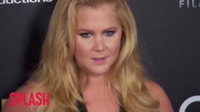 Amy Schumer Confirms She Is 'Still Pregnant And Puking'