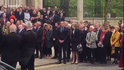 Theresa May and Leo Varadkar leave St Anne's Cathedral after Lyra McKee's funeral service