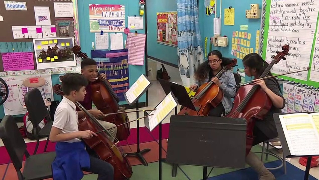 Baltimore program points kids to violins over violence