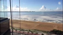 Mancha em praia de Camburi