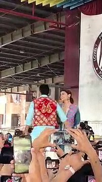 a lovely couple dancing in public!