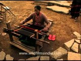 North East Indian women weaving a traditional scarf!