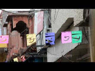 South gate to the Taj Mahal - sleepy policemen read newspapers, look bored