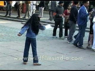 Kid spinning round and round