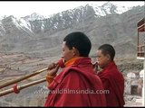 Buddhist monks playing dungchen at Dhankar Gompa