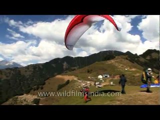 Thrilling parasailing through the mountains!