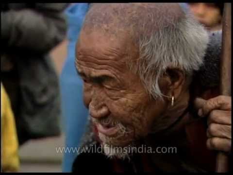 Shaman conducting rain sacrifice with chickens!
