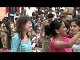 Foreigners dance with Indians at Wagah Border