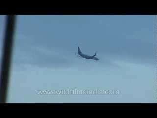 A plane flying high in the sky