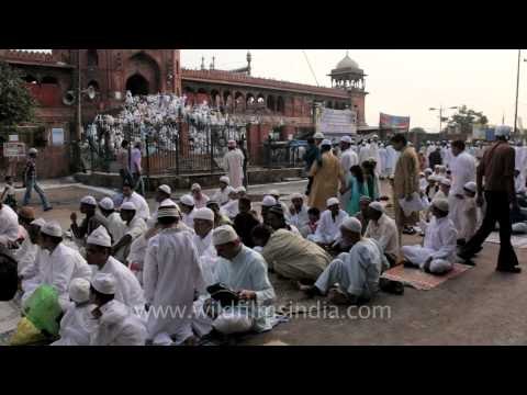 Islamic followers in traditional skull cap or 'topi' on Eid : Jama Masjid