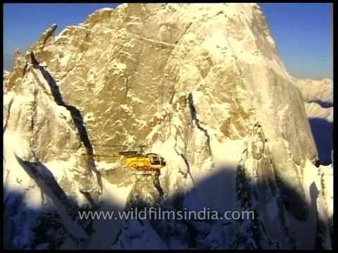 Helicopter flight over highest mountain range in the world - Himalaya!