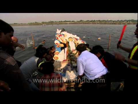 Durga idol immersion in Yamuna River