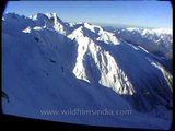 Thick white snow drapes the Himalayan peaks - View from a helicopter!