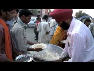 Serving free food to the poor, outside AIIMS in Delhi