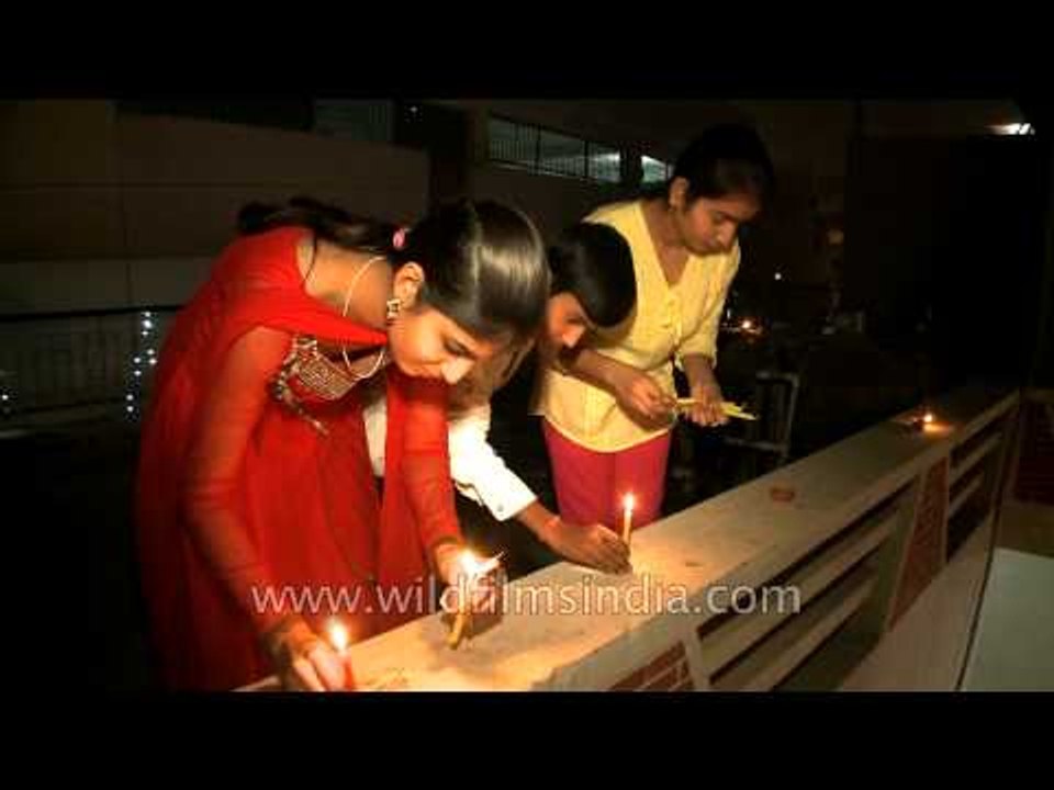 Lighting diwali candles at Fatehpur Beri