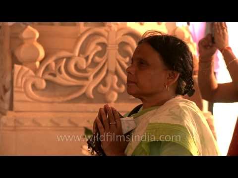 Devotees offering prayer to goddess Durga on Durga Navmi