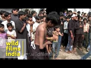 Religious devotees slash themselves on Muharram