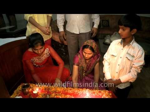 Praying for fortune - Hindu families worship Goddess Lakshmi on Diwali