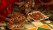 Pouring oil into Diyas for Diwali, New Delhi