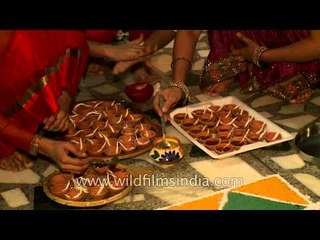 Download Video: Pouring oil into Diyas for Diwali, New Delhi