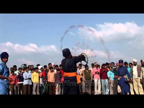 Sikh man shows Gatka at Rural Olympics