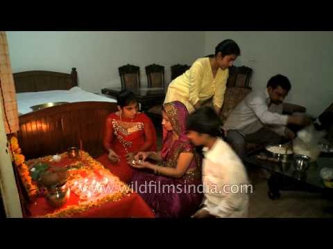 Hindu family prepares for the Diwali prayer of Goddess Lakshmi