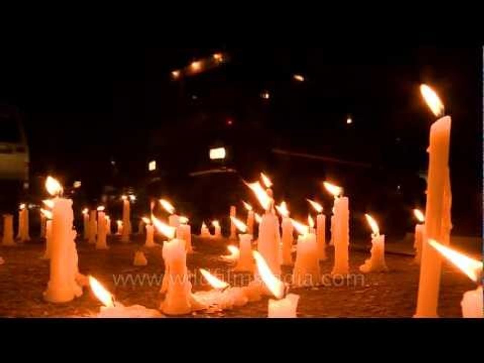 Melting candles and youth's demonstration against physical assault in Delhi