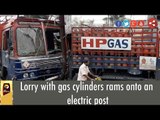 Lorry with gas cylinders rams onto an electric post