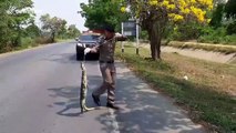 Kind-hearted cop gives 'proper burial' to monitor lizard killed by speeding car