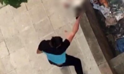 Köpeklerinin saldırdığı kediyi çöp gibi bir kenara attılar