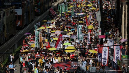 Hongkongers march in protest against proposed extradition law