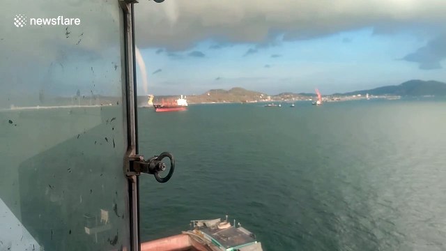 Ship workers stunned by huge water tornado off a Thai island
