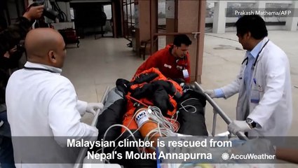 'A miracle' as mountain climber stranded in frigid weather is rescued, expected to survive