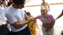Varun Dhawan Helps Old Woman Cast Vote, Wins Hearts || Filmibeat Telugu