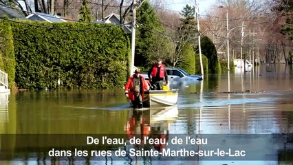 Rues inondées près de Montréal, des milliers d'évacuations