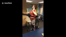 Paraplegic stands for the first time in four years thanks to new support frame